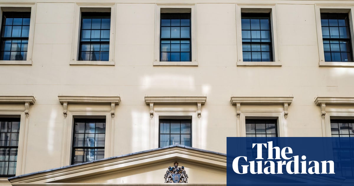 Met investigates racist graffiti found in staff area at its own police station | Metropolitan police
