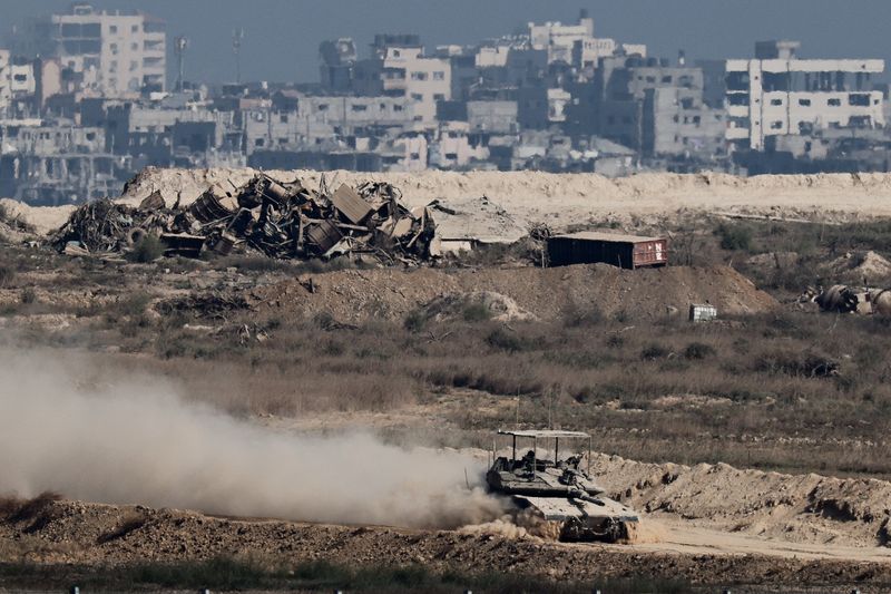 Hamas says it lost contact with two hostages as tanks thrust deeper into Gaza City