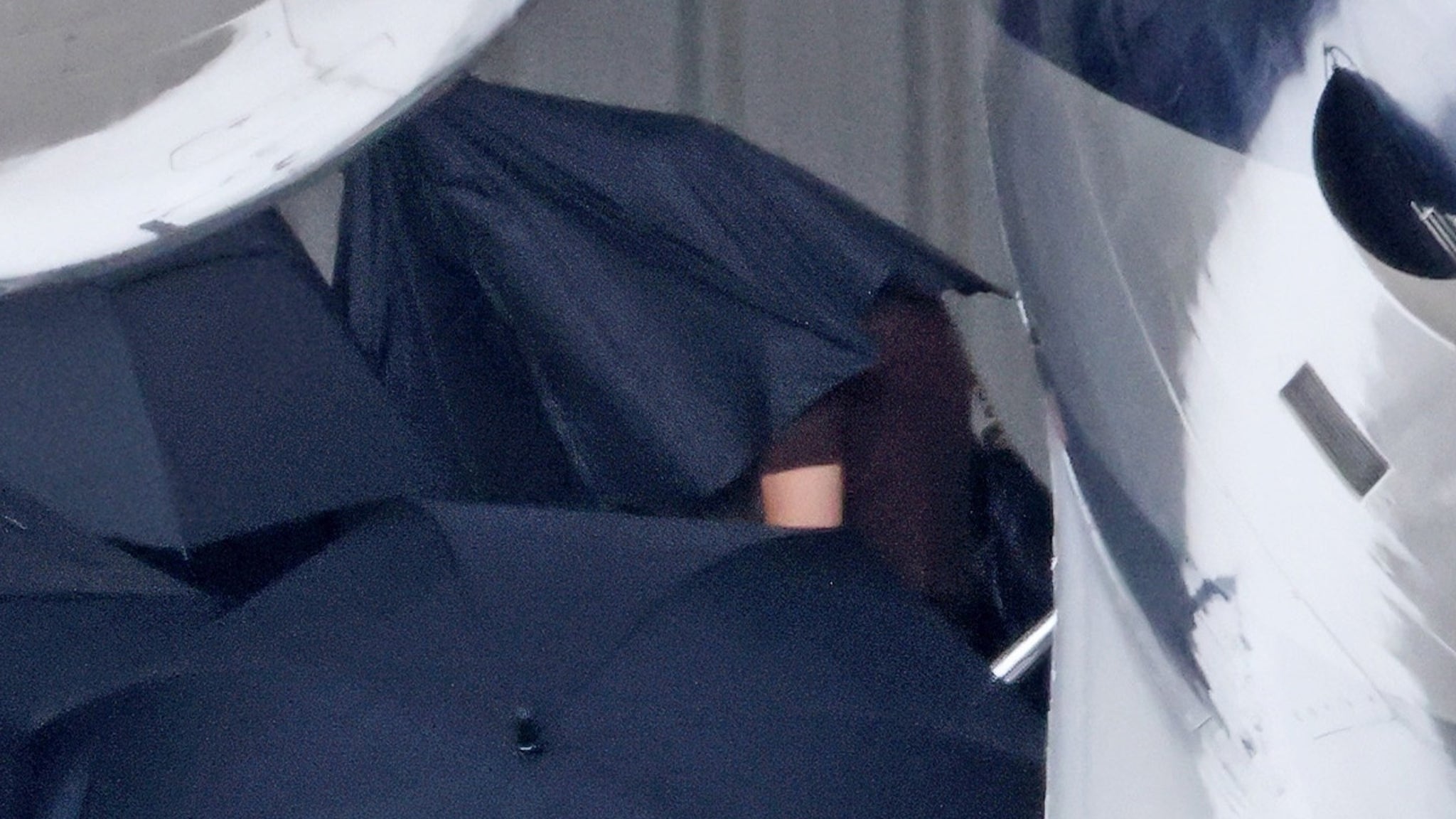 Taylor Swift Lands in California for Selena Gomez’s Wedding, Covers Up With Umbrellas