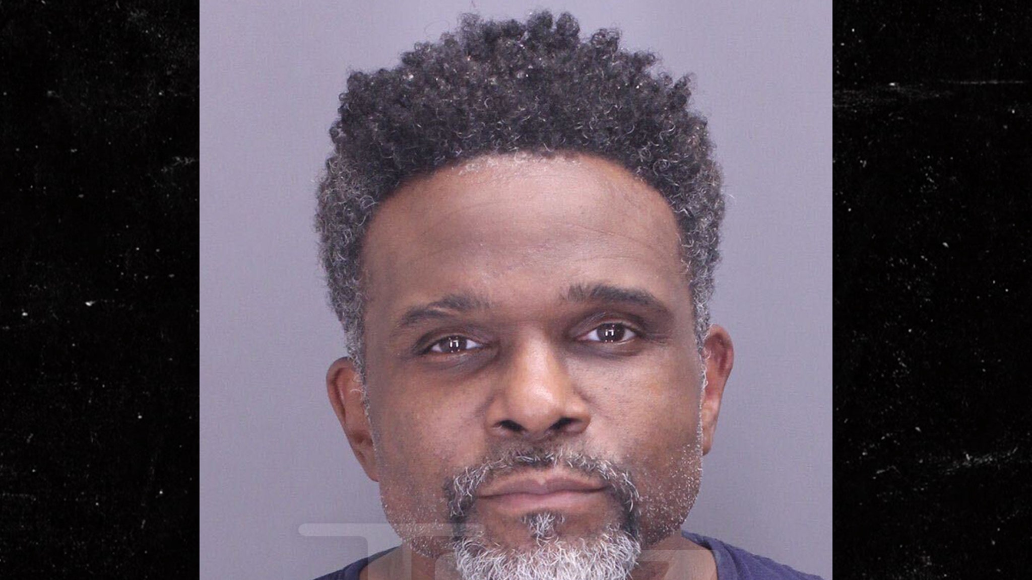 Darius McCrary Poses for Mug Shot After Extradition to Michigan Jail
