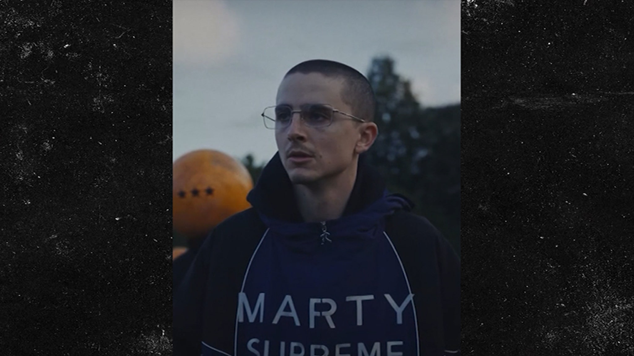 Timothée Chalamet Debuts Shaved Head in ‘Marty Supreme’ Promo