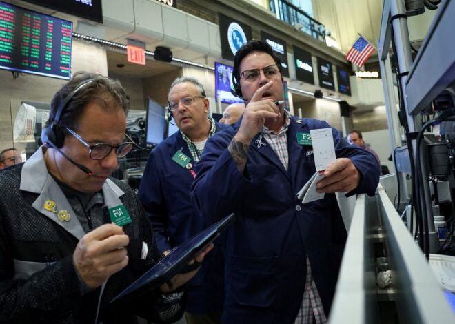 Wall St ends higher amid mixed earnings, Trump-Xi meeting confirmed