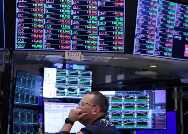 Wall Street eases from record highs on rising economic jitters 