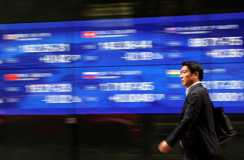 Asia shares pulled higher by Nikkei surge, China GDP beats
