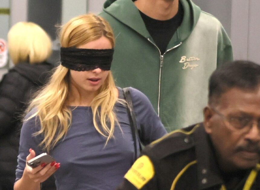 Addison Rae Wears Eye Mask On Her Way Out of Airport